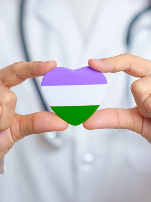 medical-professional-holding-colorful-heart-with-t-2026-03-19-21-52-58-utc
